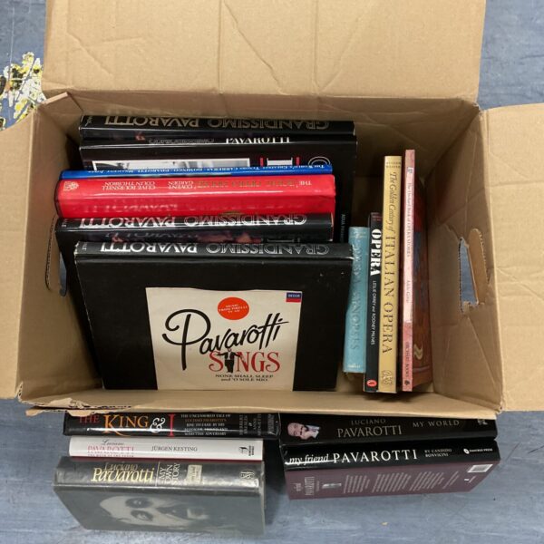 Luciano Pavarotti books and vinyl record collection for sale.