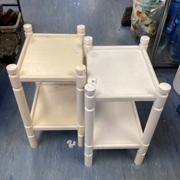 Pair of shabby chic bedside tables with distressed paint finish.