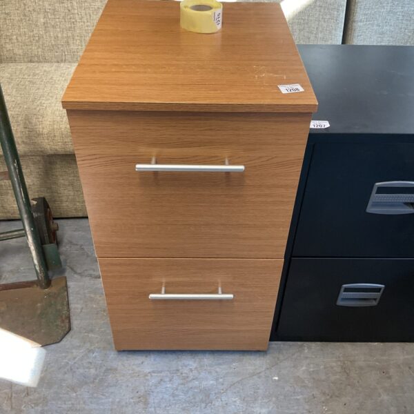 Vintage metal two-drawer filing cabinet for office storage.