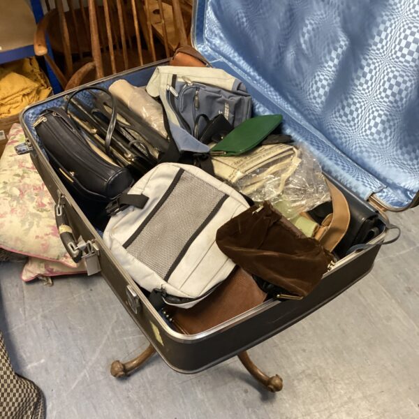 Vintage bag lot inside an Antler suitcase, retro handbags.