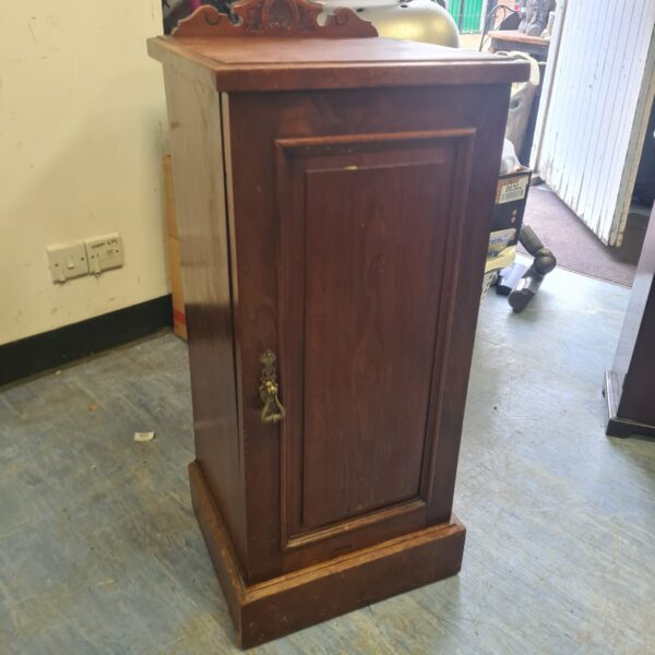 Small Edwardian oak cabinet with a single door.