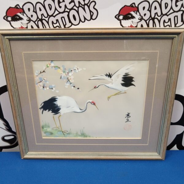 Vintage Chinese silk painting of cranes under blossom.