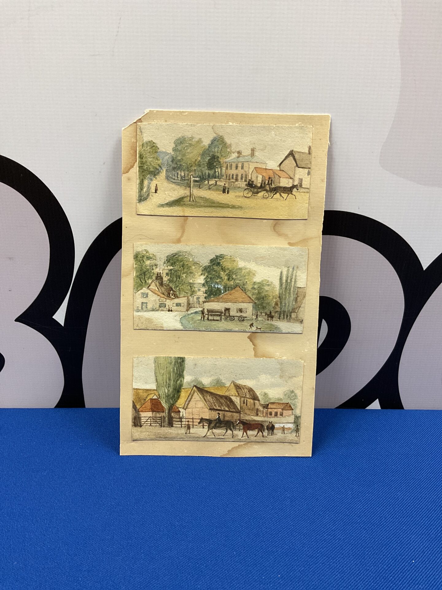 045 19th century a set of three watercolours depicting village scenes