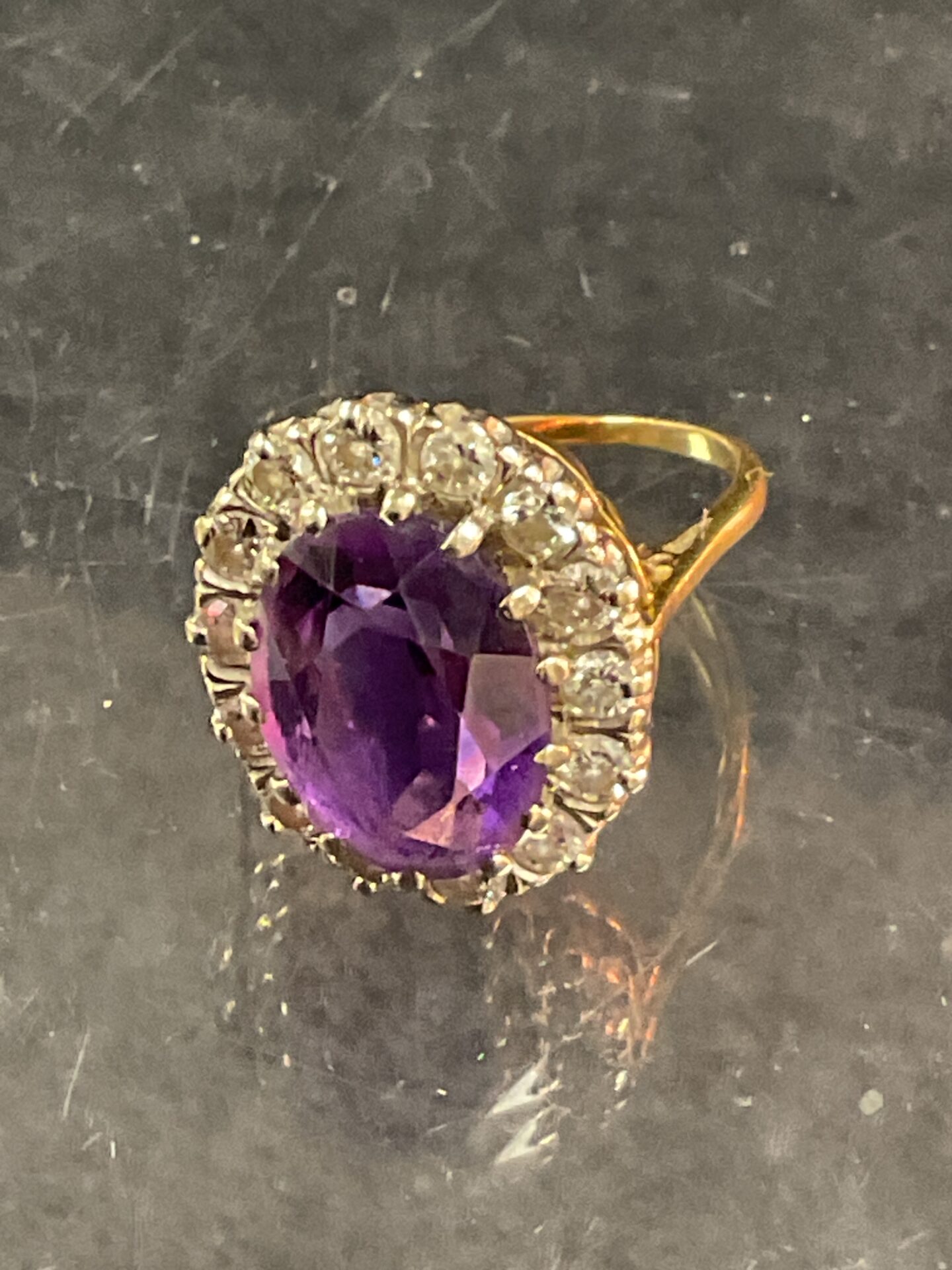 891 9 carat gold diamond and amethyst cocktail ring 14 round diamonds 7.2g gross Size Q