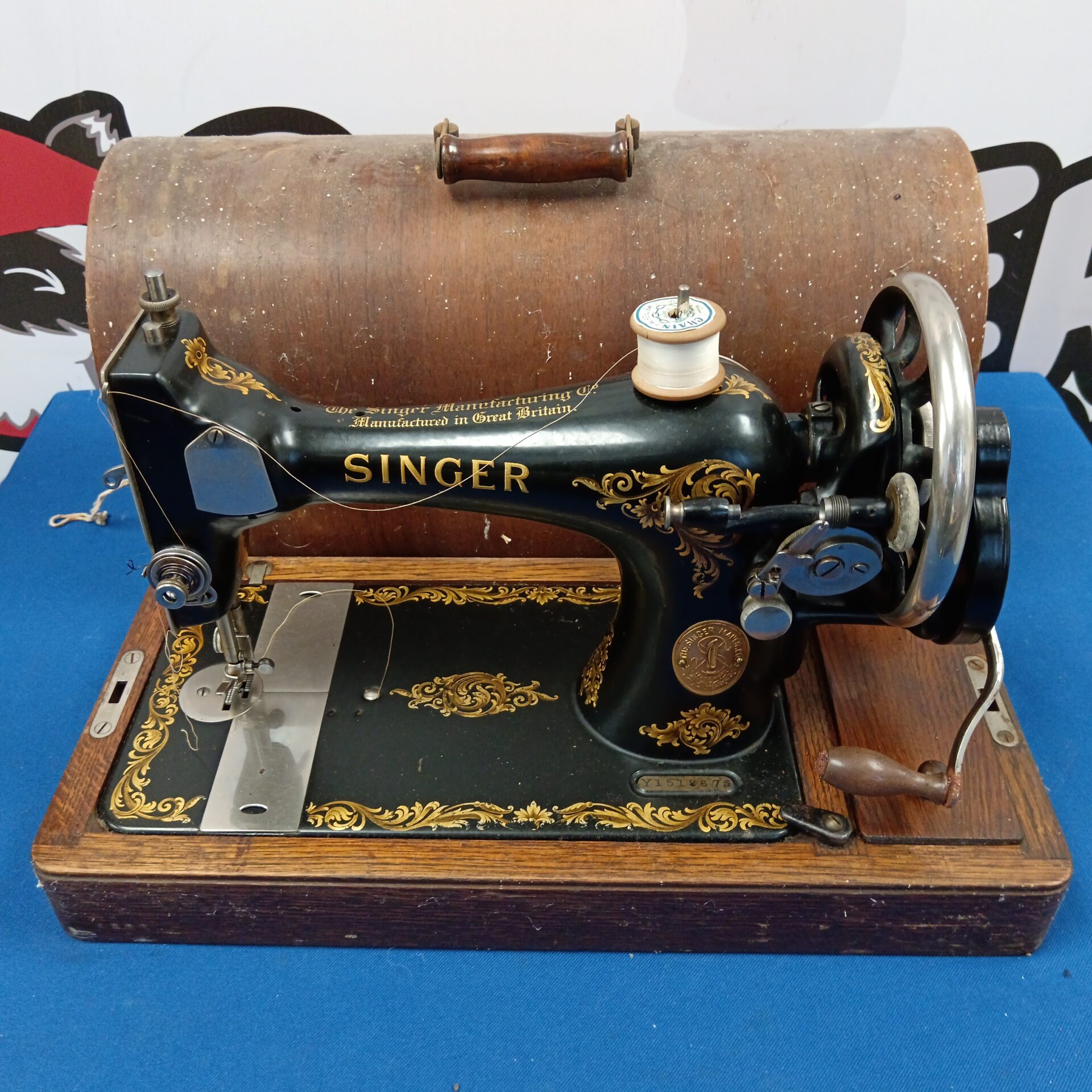 073 Antique hand cranked singer sewing machine