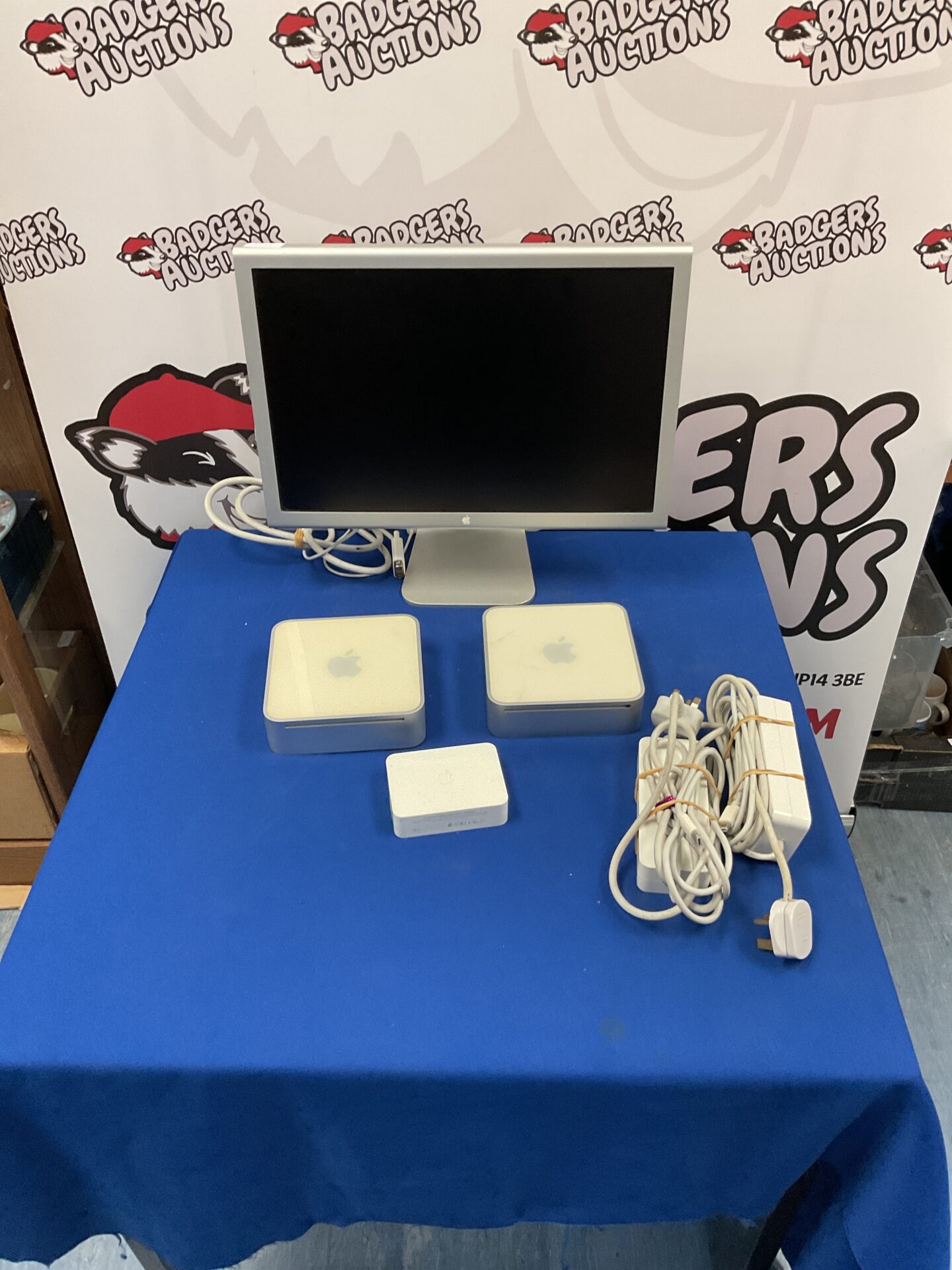 183 Apple Mac Mini units models A1103 and A1176 with HD cinema display monitor
