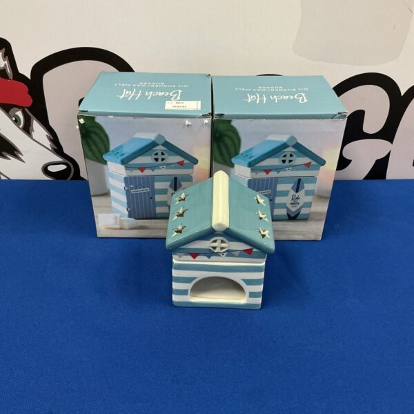 Vibrant pottery beach hut oil burner for wax melts.
