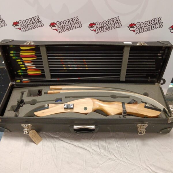 Vintage Beauchamp Hurricane bow in its original case with arrows.