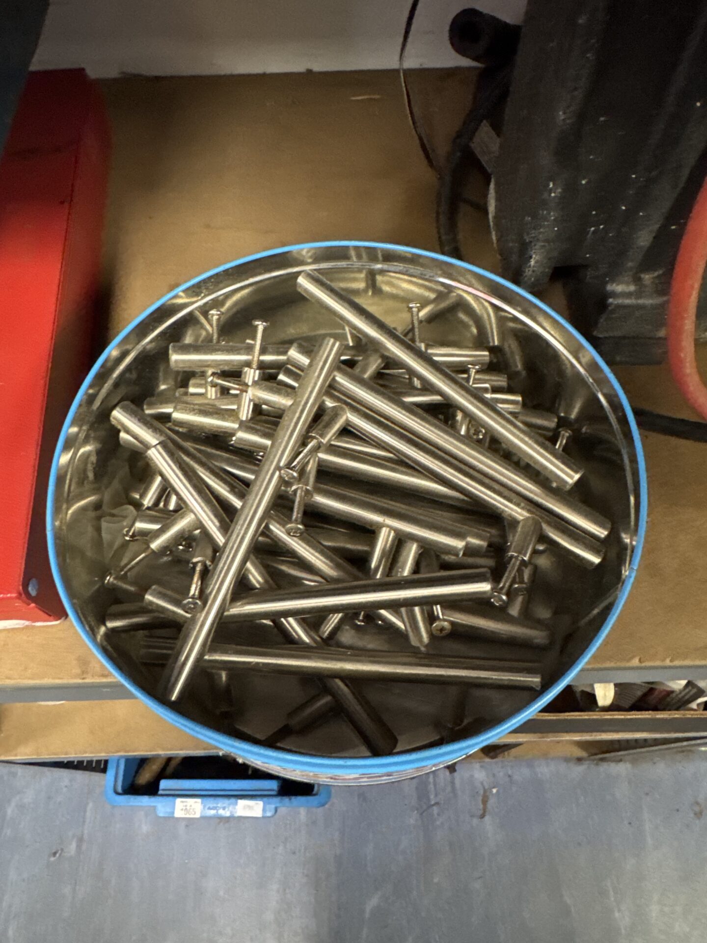 1059 Large quantity of brushed steel drawer/cupboard handles