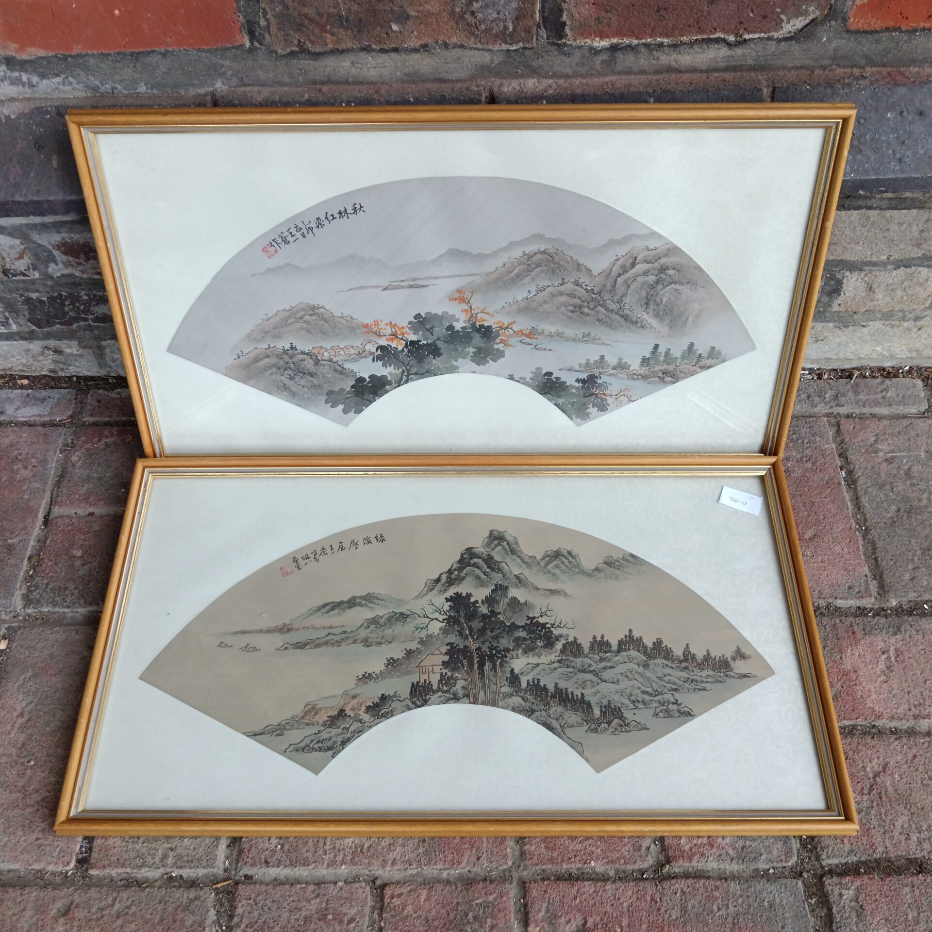 789 Pair of Chinese fan watercolours on silk of mountain landscapes with blossom trees
