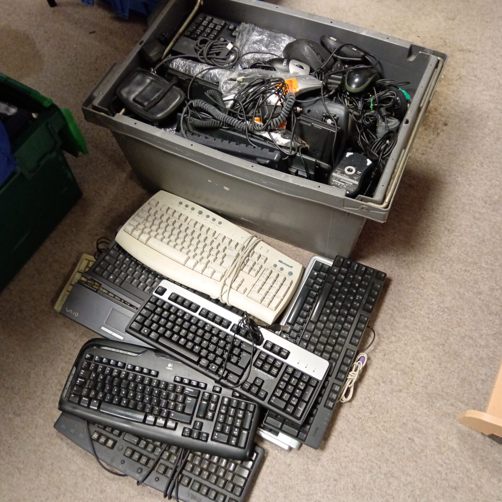 1425 Large crate full of computer keyboards