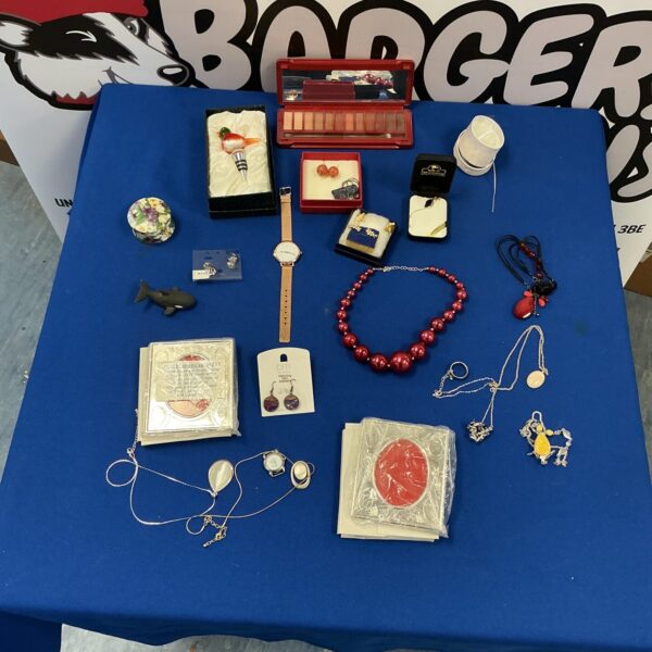 Mixed lot of vintage and costume jewellery with a red necklace.