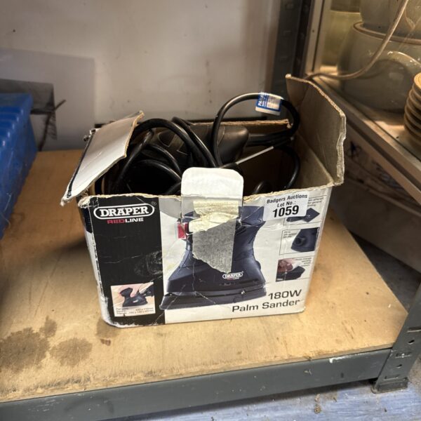 Draper Redline palm sander in used condition, ideal for DIY projects.