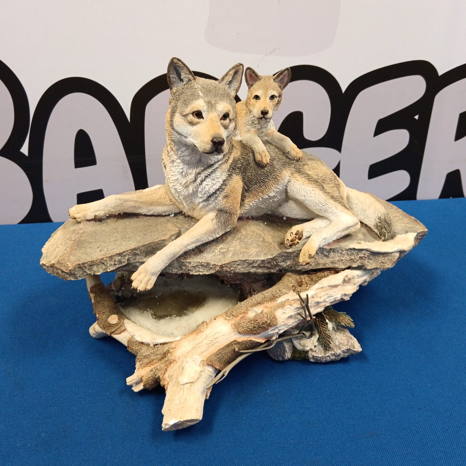 005 Country artists hand painted wolf sculpture titled early thaw father & cub