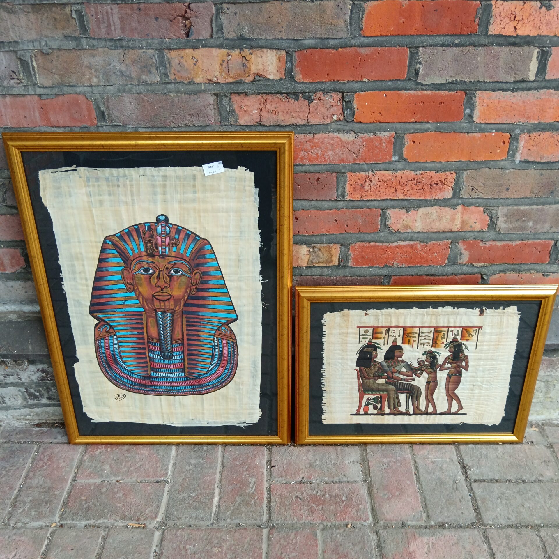 778 Two gilt framed Egyptian paintings on papyrus