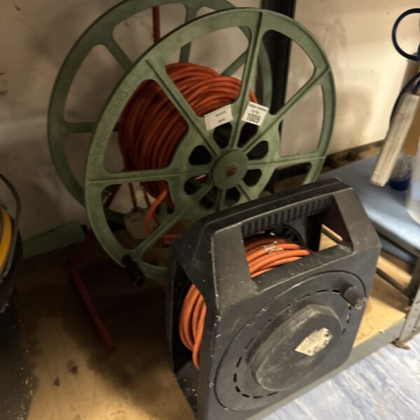 Plastic extension reel for managing electrical or garden cable.