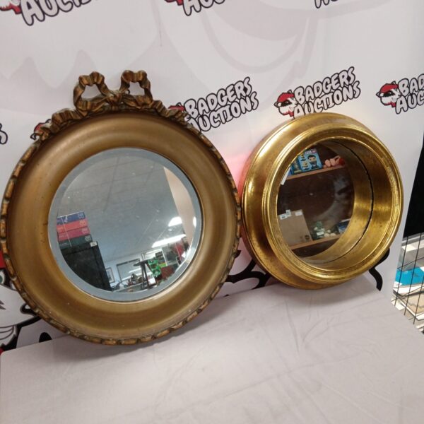 Pair of vintage gilt framed round mirrors for wall decor.
