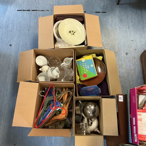 House clearance lot with boxes of china and glassware.