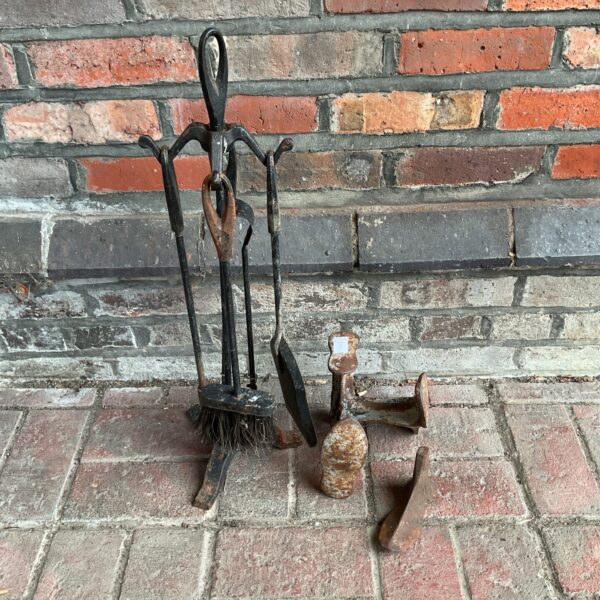 Vintage fireplace companion set with cobblers last and shoe tree.