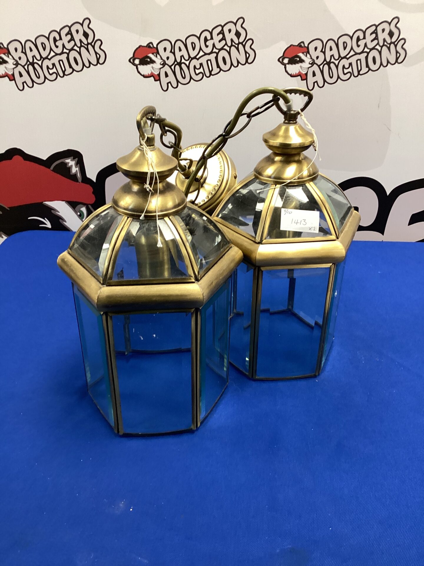 673 Two brass lantern style ceiling lights