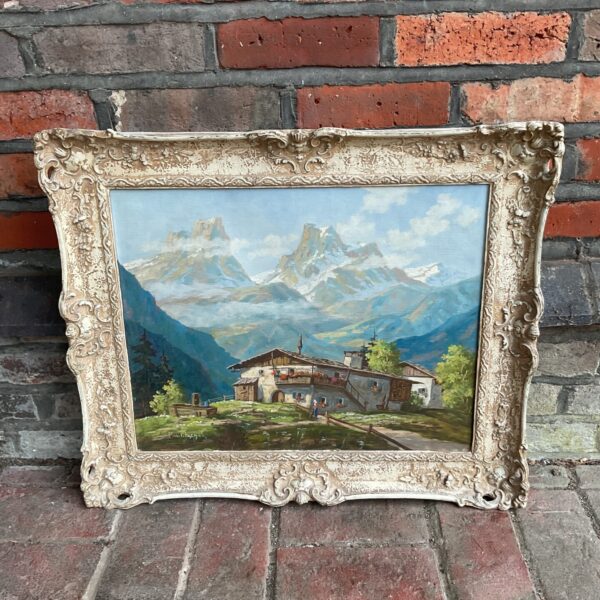 Vintage Pawlitschak painting of a Swiss mountain landscape with a village.