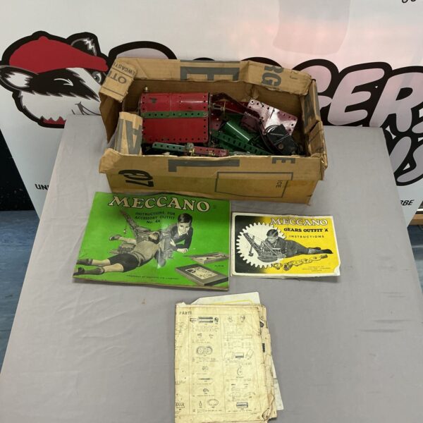 Vintage Meccano catalogues and instruction manuals, collectible toys.