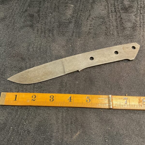 Unfinished Damascus steel knife blade for custom knife making.