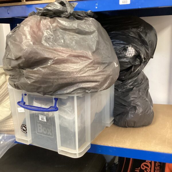 Clothing bundle with bin bags and storage box.