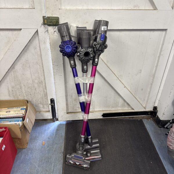 Dyson V6 Absolute cordless vacuum cleaner bundle for parts or repair.