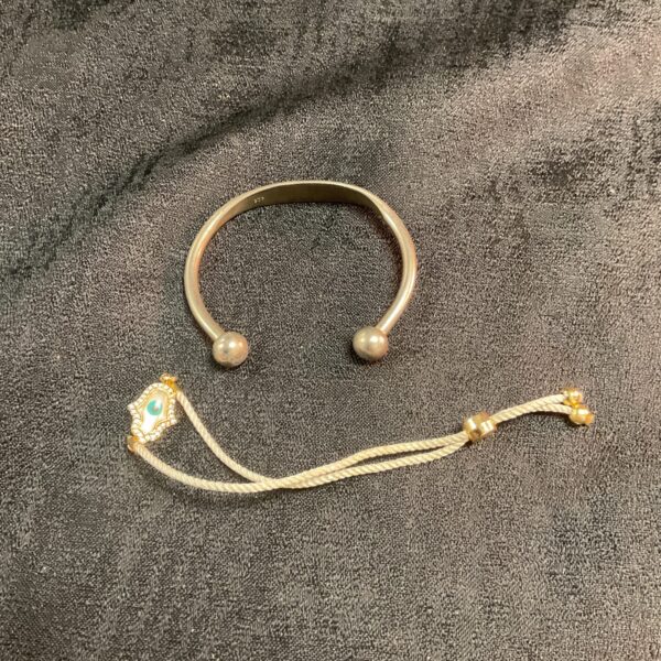 Stylish silver and cord bracelet for women.