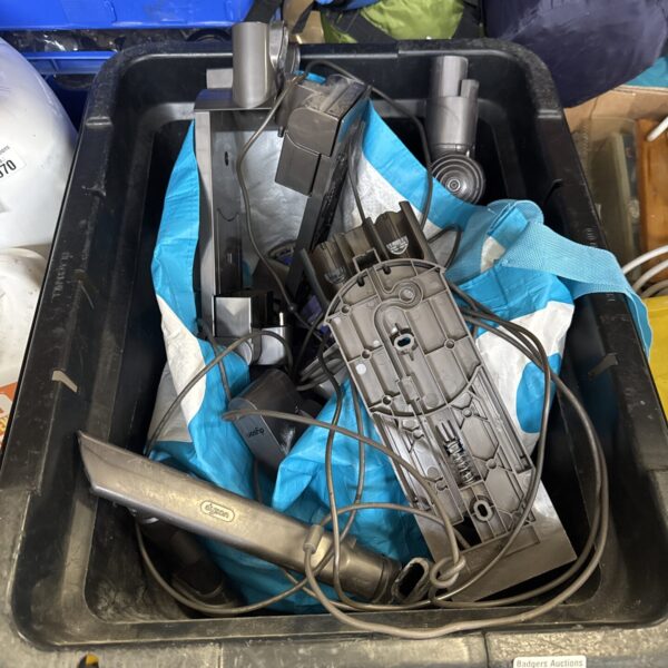 Dyson hoover accessories lot with various cleaning attachments.