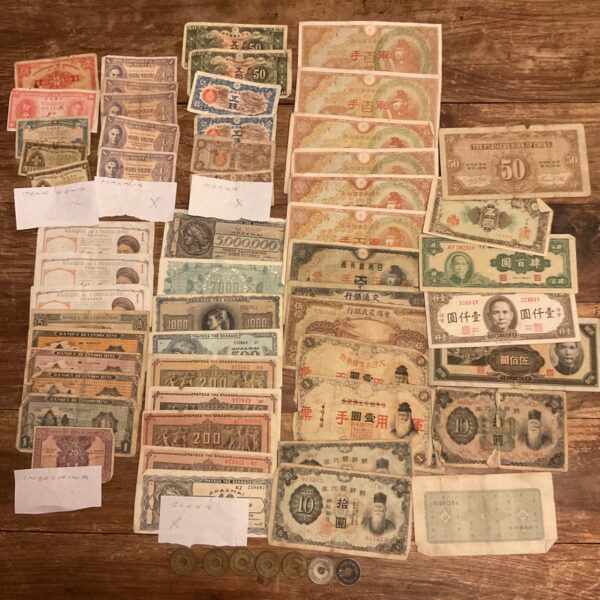 Wartime banknotes and coins collection from Asia and Fiji.