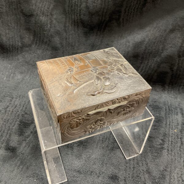 Antique Japanese bronze trinket box with repousse design.
