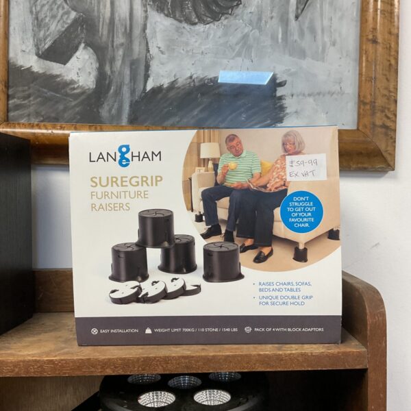 Set of four Lanham Suregrip furniture risers for elevating furniture.