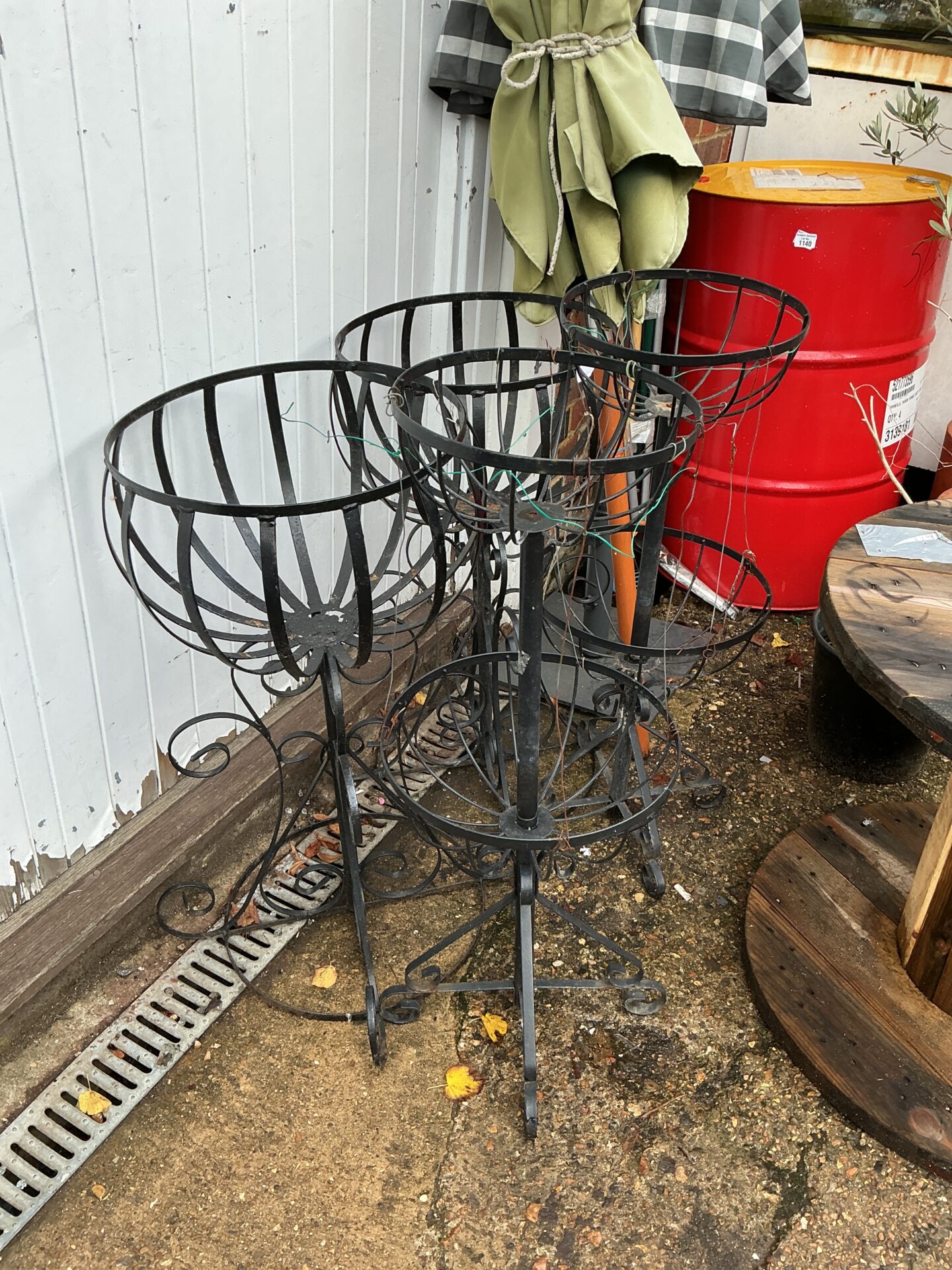 1143 Four metal garden basket plant stands