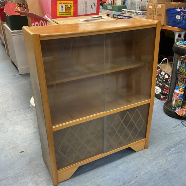 Vintage mid-century modern display cabinet with glass front.