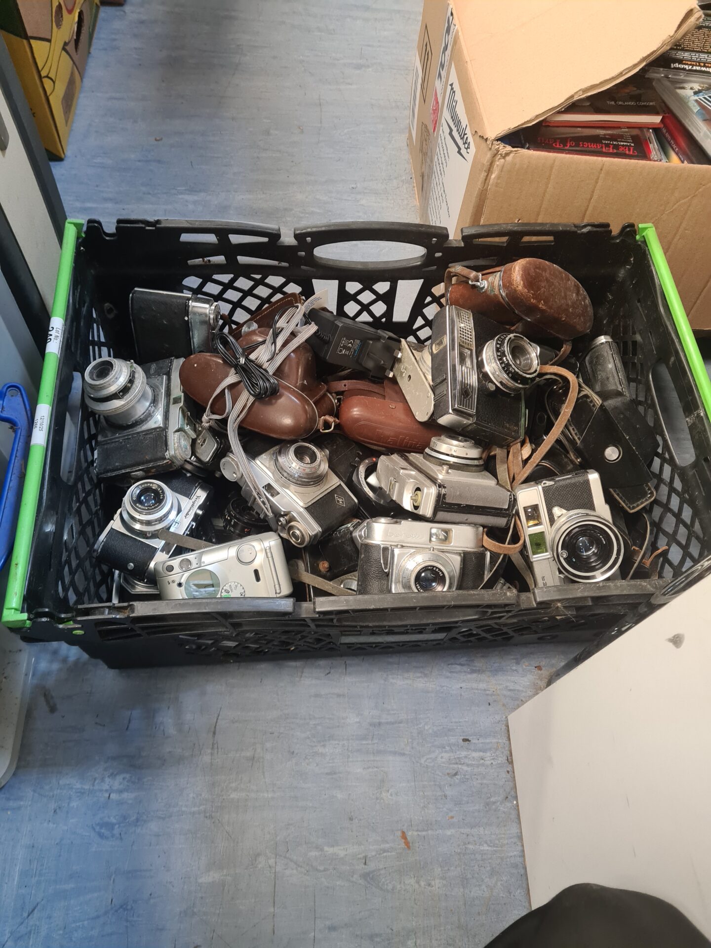 240 Box full of mixed cameras inc canon and berette