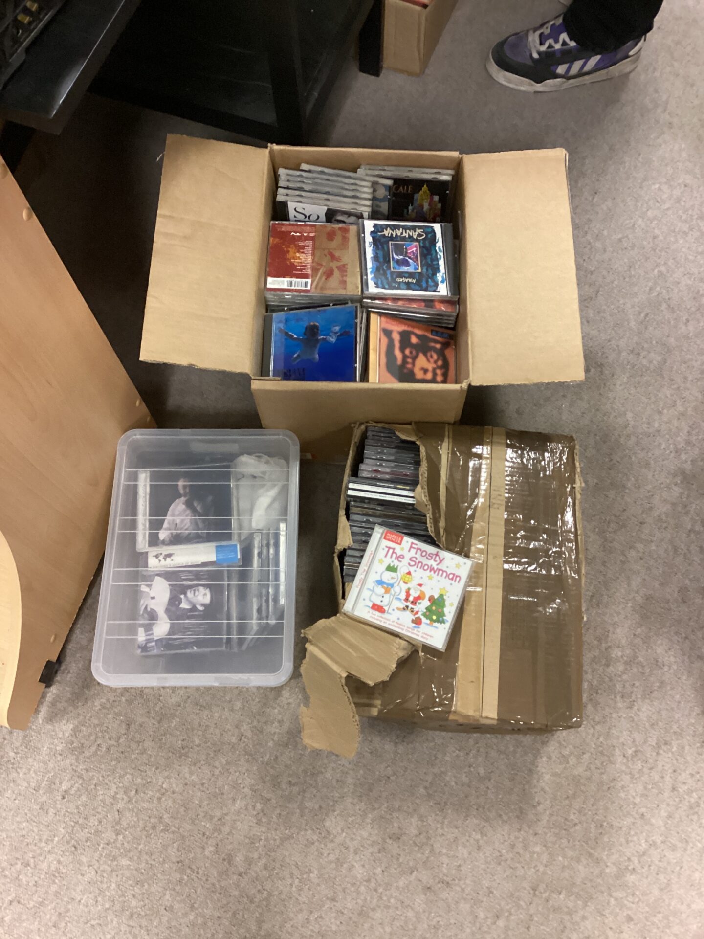 1390 Three boxes of mixed music CDs inc nivana, R.E.m & frosty the snowman