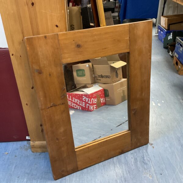 Rustic pine framed mirror for farmhouse style decor.