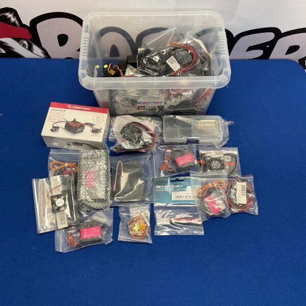 Mixed lot of RC parts and accessories including Hobbywing components.