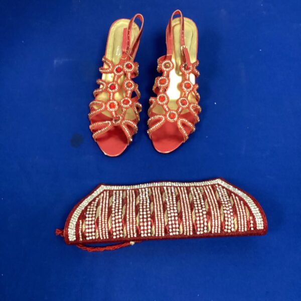 Red platform shoes and clutch bag set, size 8, for evening wear.