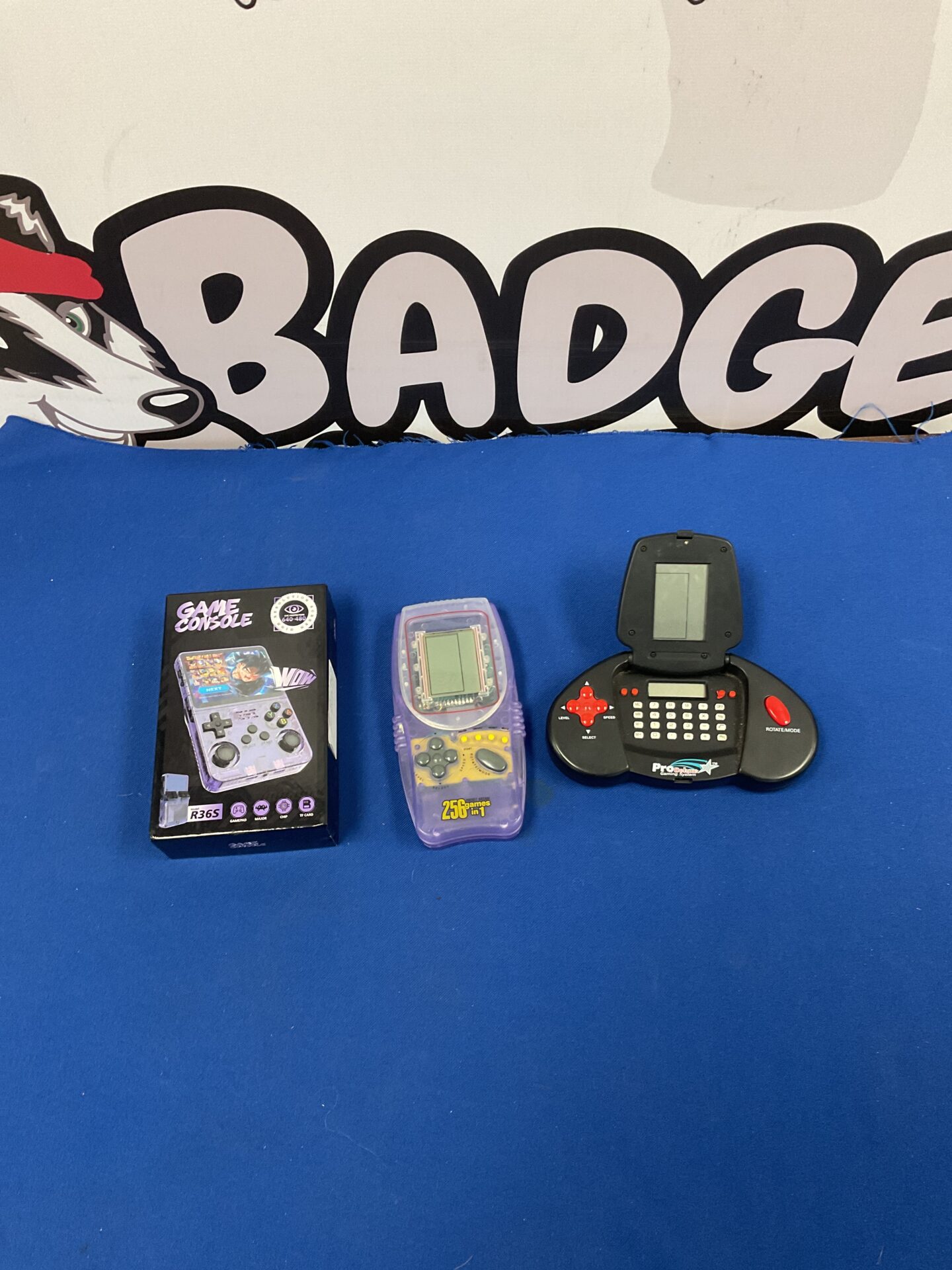 182 R36S game console, 256 in 1 pocket arcade, and ProTech prodeluxe gaming system