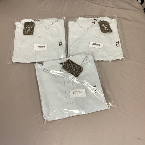 Lot of three new Riche Luxe men's shirts presented for auction.