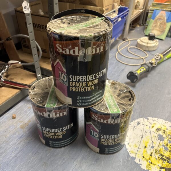 Three full tins of Sadolin Superdec satin opaque wood protection.