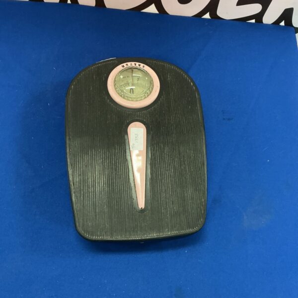 Vintage Salter scales with white enamel pan and brass mechanism.