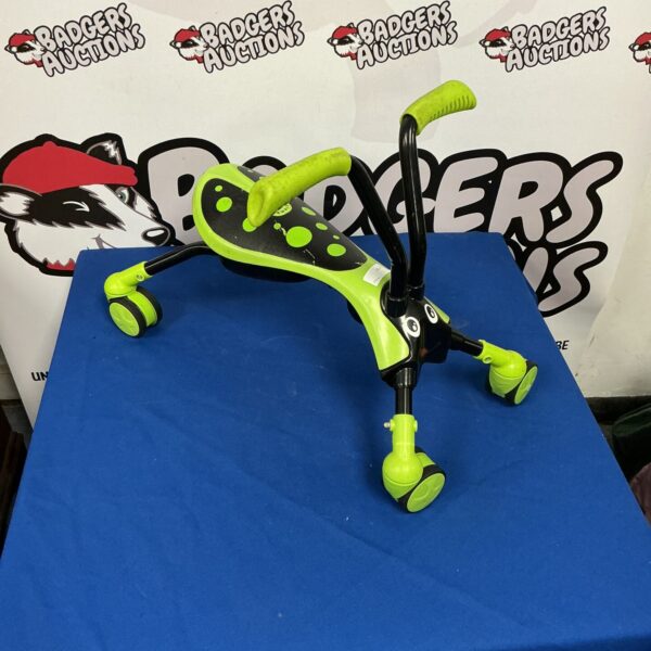 Bright green and blue Scramble Bug ride-on toy for children.