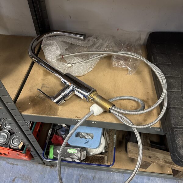 Chrome swan neck kitchen tap with tails in a storage bin.
