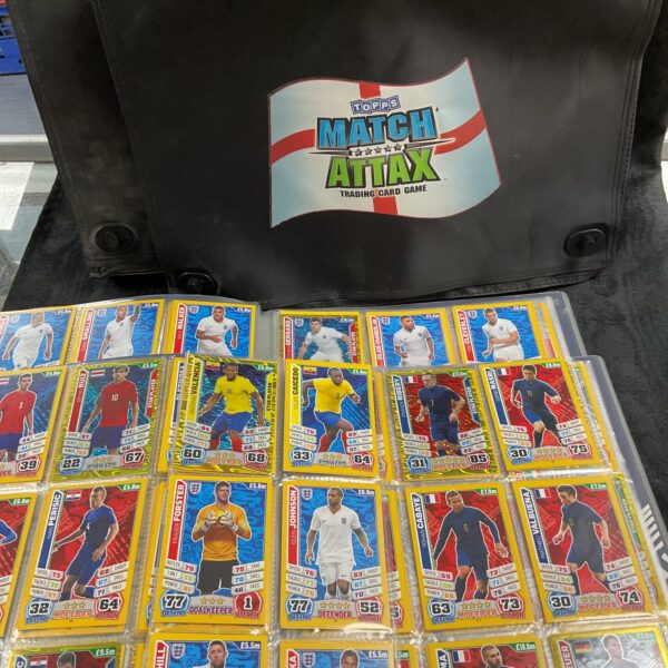 Topps Match Attax 2014 carry cases with albums visible.