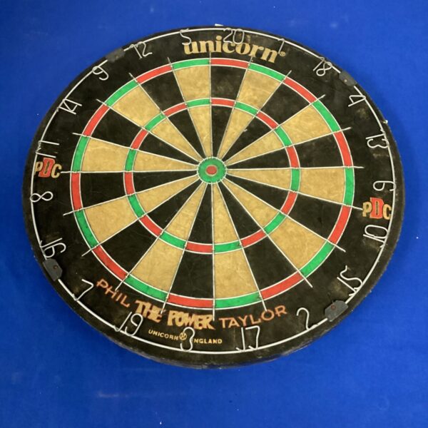 Close-up of a Unicorn professional sisal dartboard for competition.