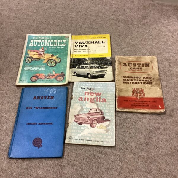 Lot of vintage car manuals including Austin and Vauxhall.